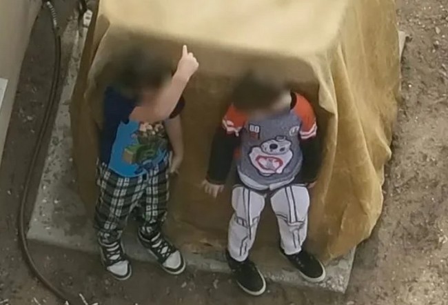 Brothers Aged 7 and 9 in Armed Police Standoff Caught on Video