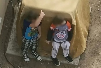 Brothers Aged 7 and 9 in Armed Police Standoff Caught on Video