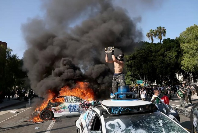How Waymo Robotaxis Became Flashpoints in LA Protest Fires